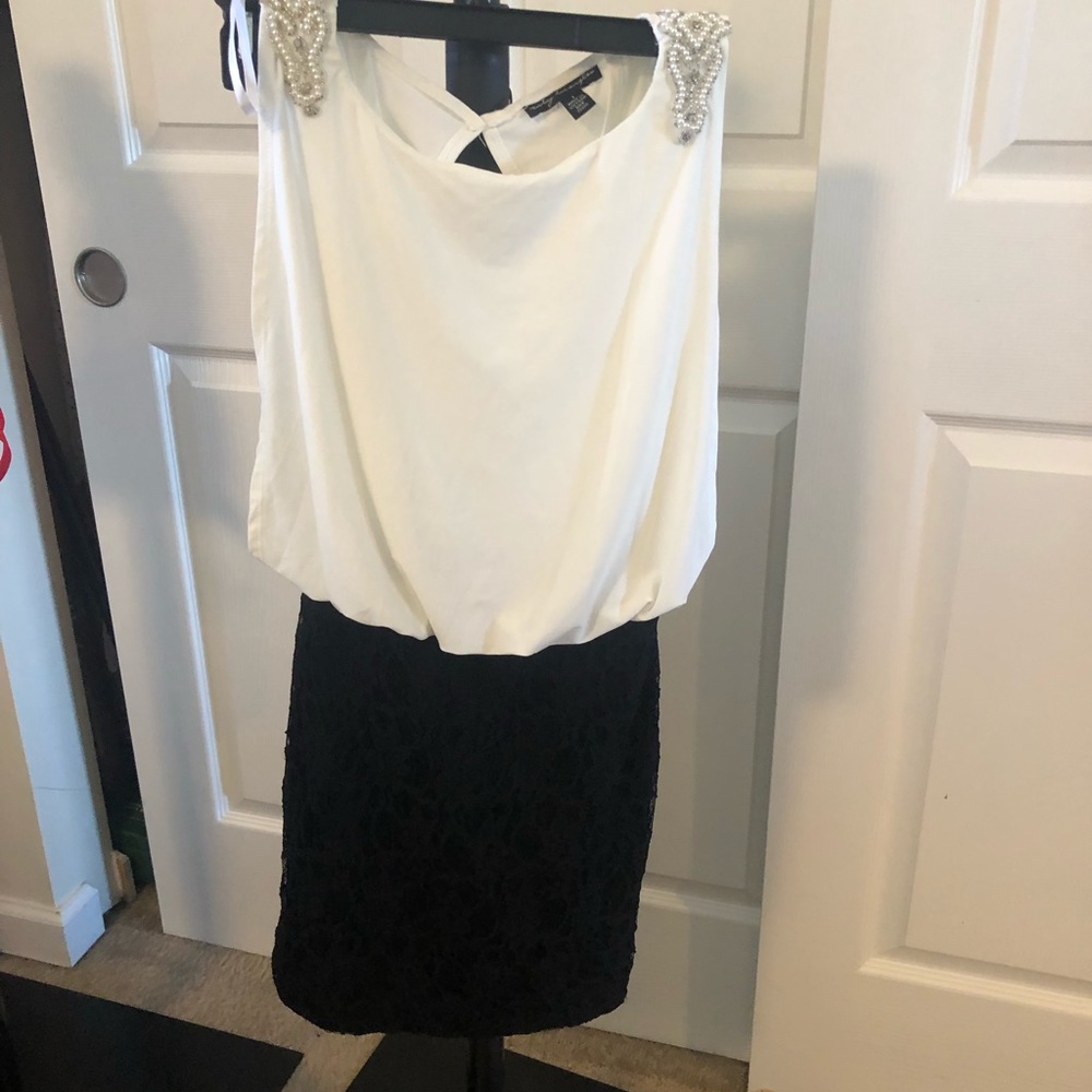 Size 1 City Triangeles black & white open back dress with beading on the straps